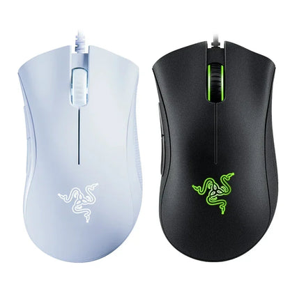 Two Razer gaming mice, one white and one black, on a white background.