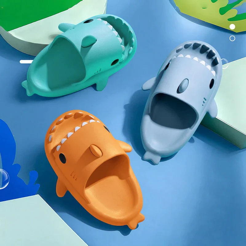 Enjoy comfort with our Shark Slides. Cushioned footbed and playful design for beach fun.